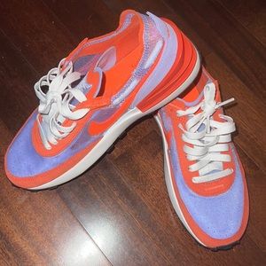 Nike orange and purple waffles in size 7. Love these, but they’re too big!
